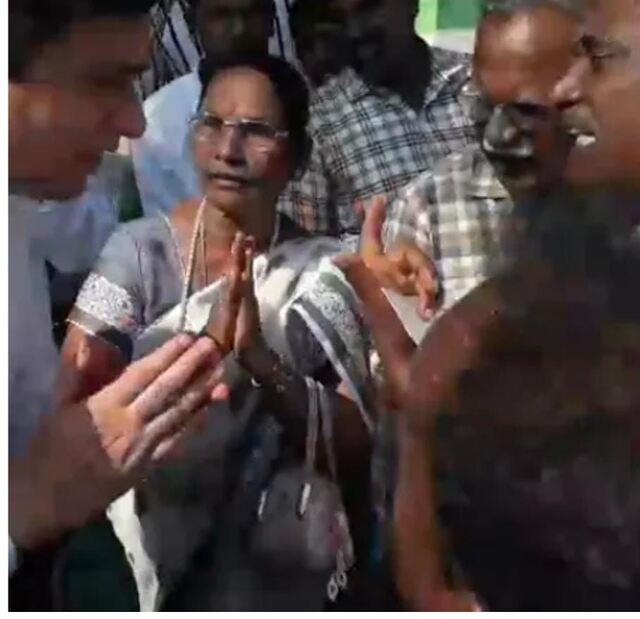దళితుల కాళ్ల పట్టుకుని.. జిల్లా కలెక్టర్ క్షమాపణ 
